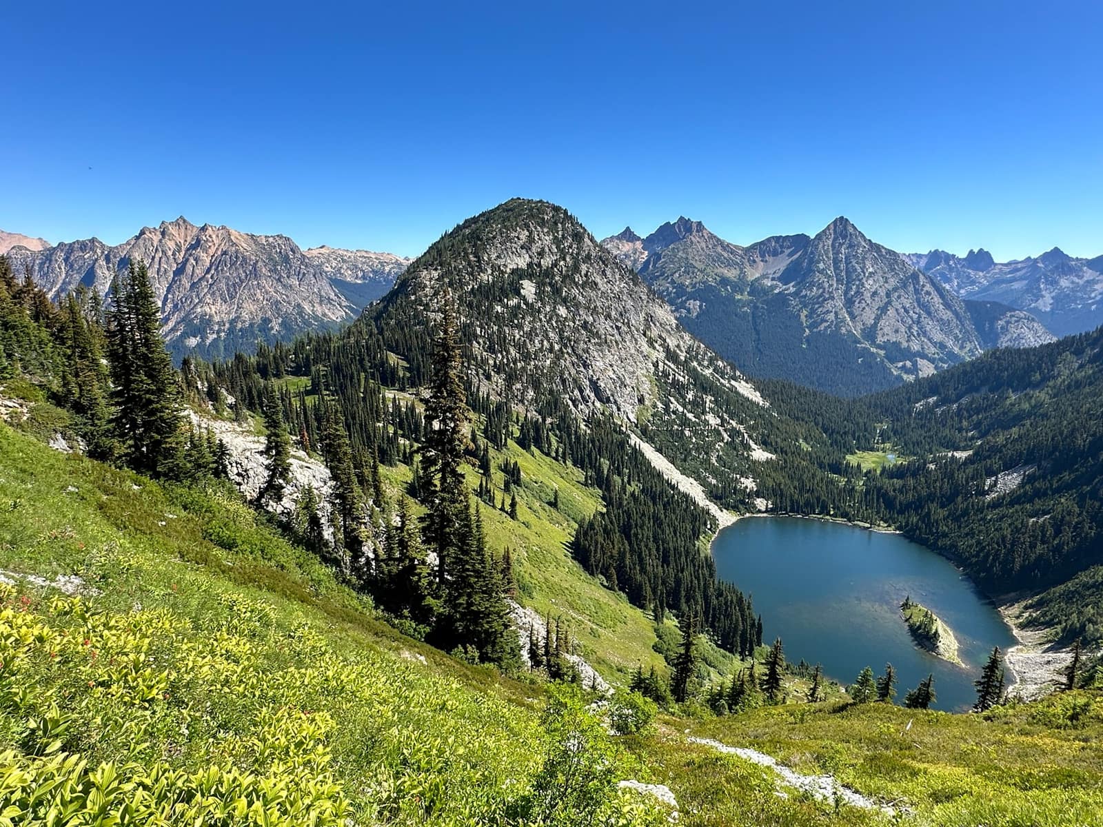 Lake Ann below the Maple Pass trail in the North Cascades, ringed by granite peaks and alpine meadows
